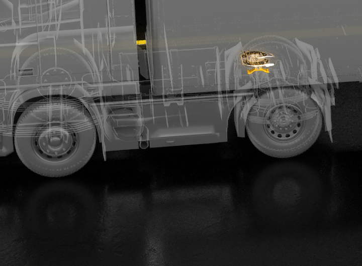 Illustration of a truck with SAF-HOLLAND chassis components highlighted in yellow.